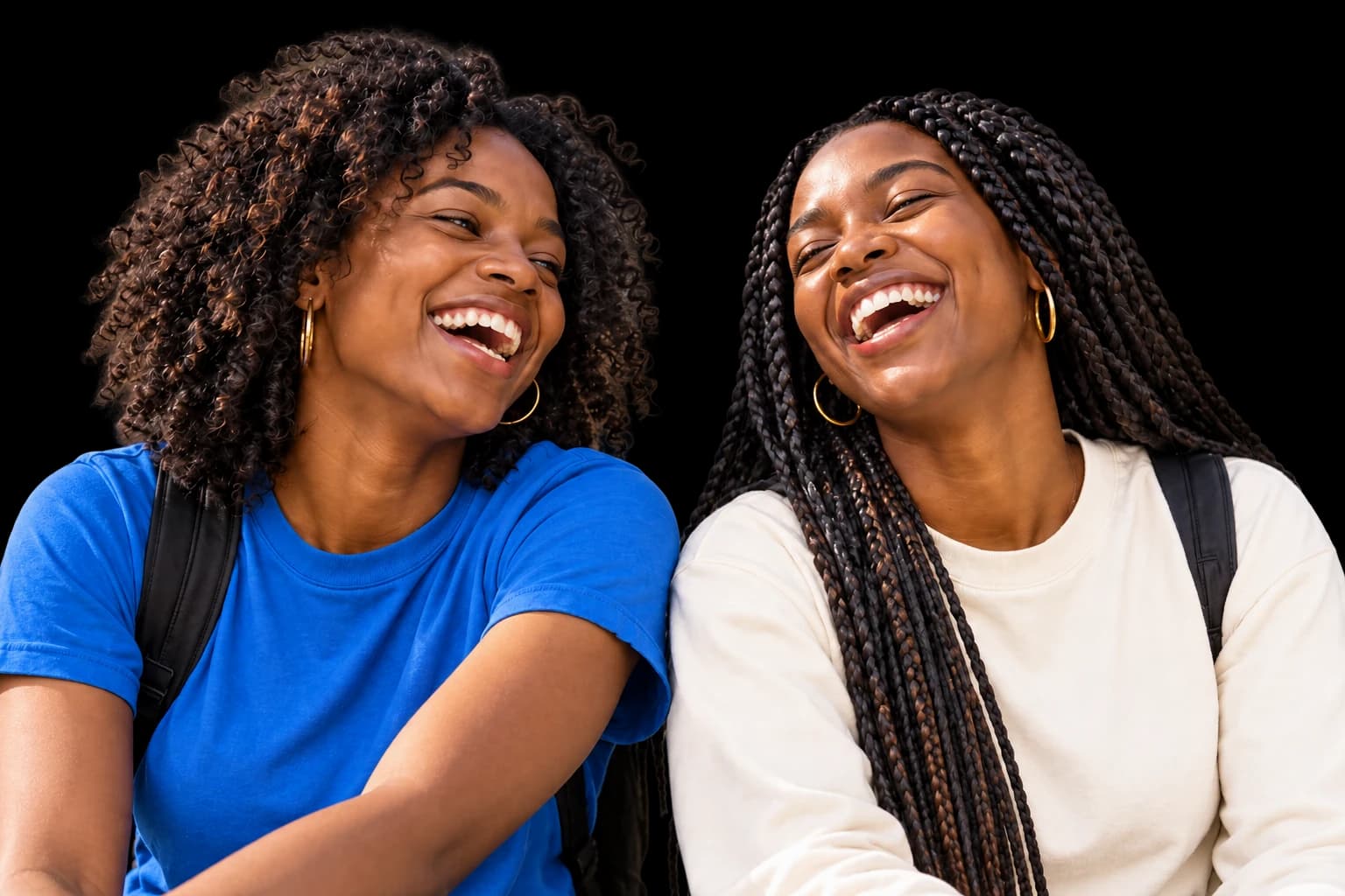 Two young friends laughing together